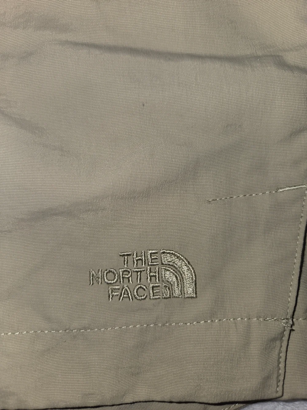 The North Face Women's Khaki Athletic Shorts with Yellow Contrast Belt